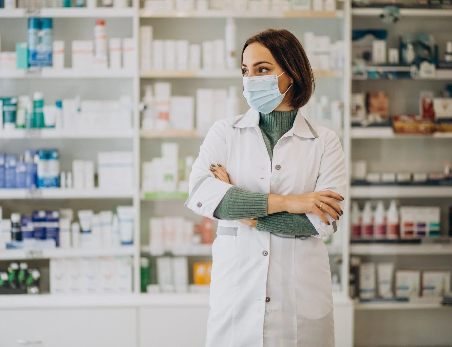 Young woman pharmacist at pharmacy